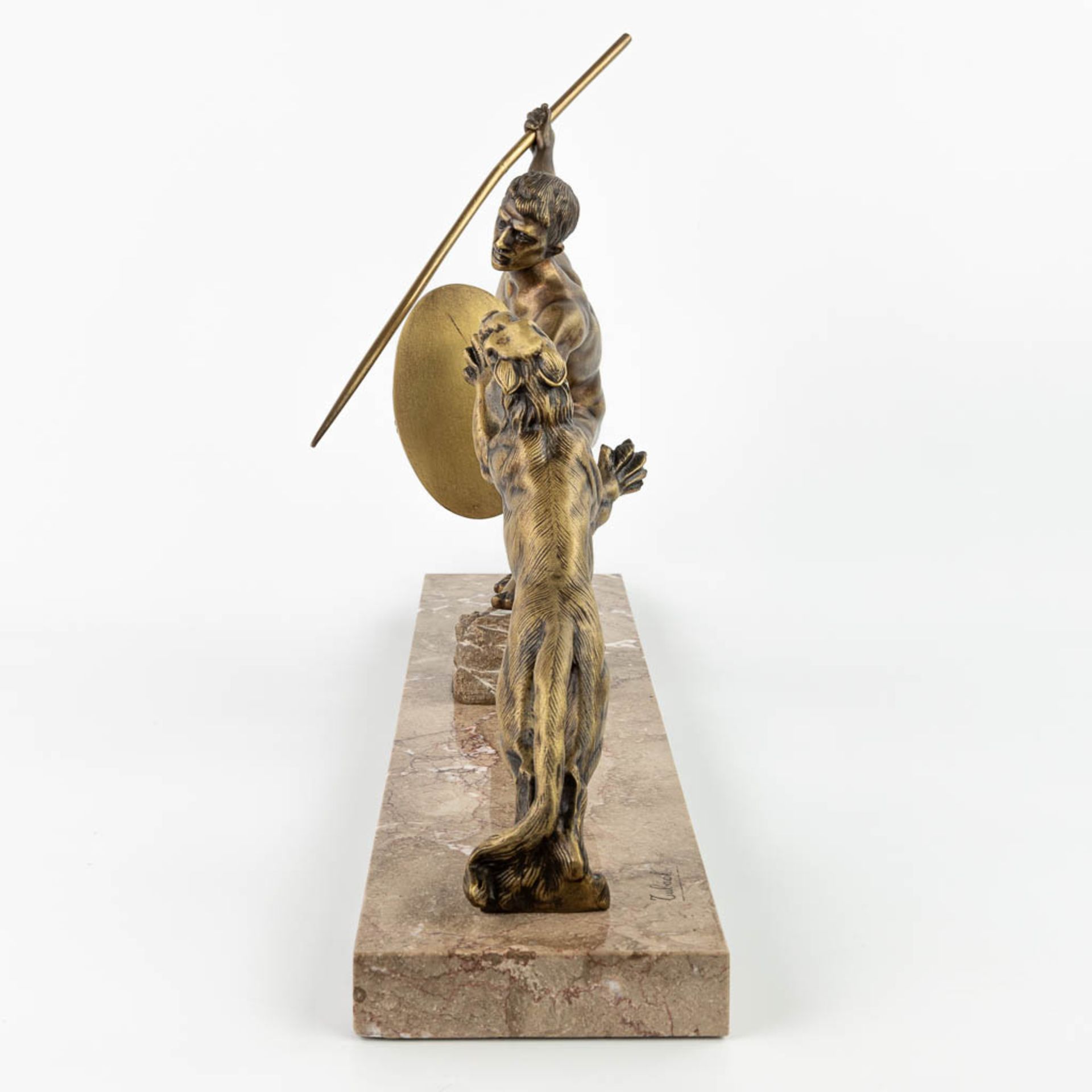 R. TUBACK (XIX-XX) 'Hunter with lion' an art deco statue made of bronze and mounted on a marble base - Image 5 of 11