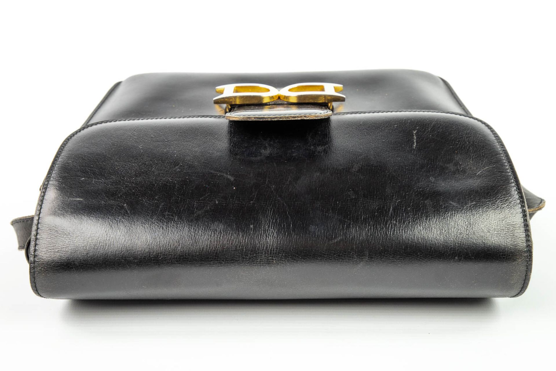 A purse made of black leather and marked Delvaux. (H:21cm) - Image 11 of 11