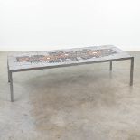 A coffee table made of ceramics on a chrome base and made by Perignem in Beernem. (H:38cm)