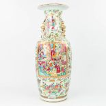 AÊChinese Canton vaseÊmade of porcelain andÊdecorated with salamanders and images of the emperor. (H