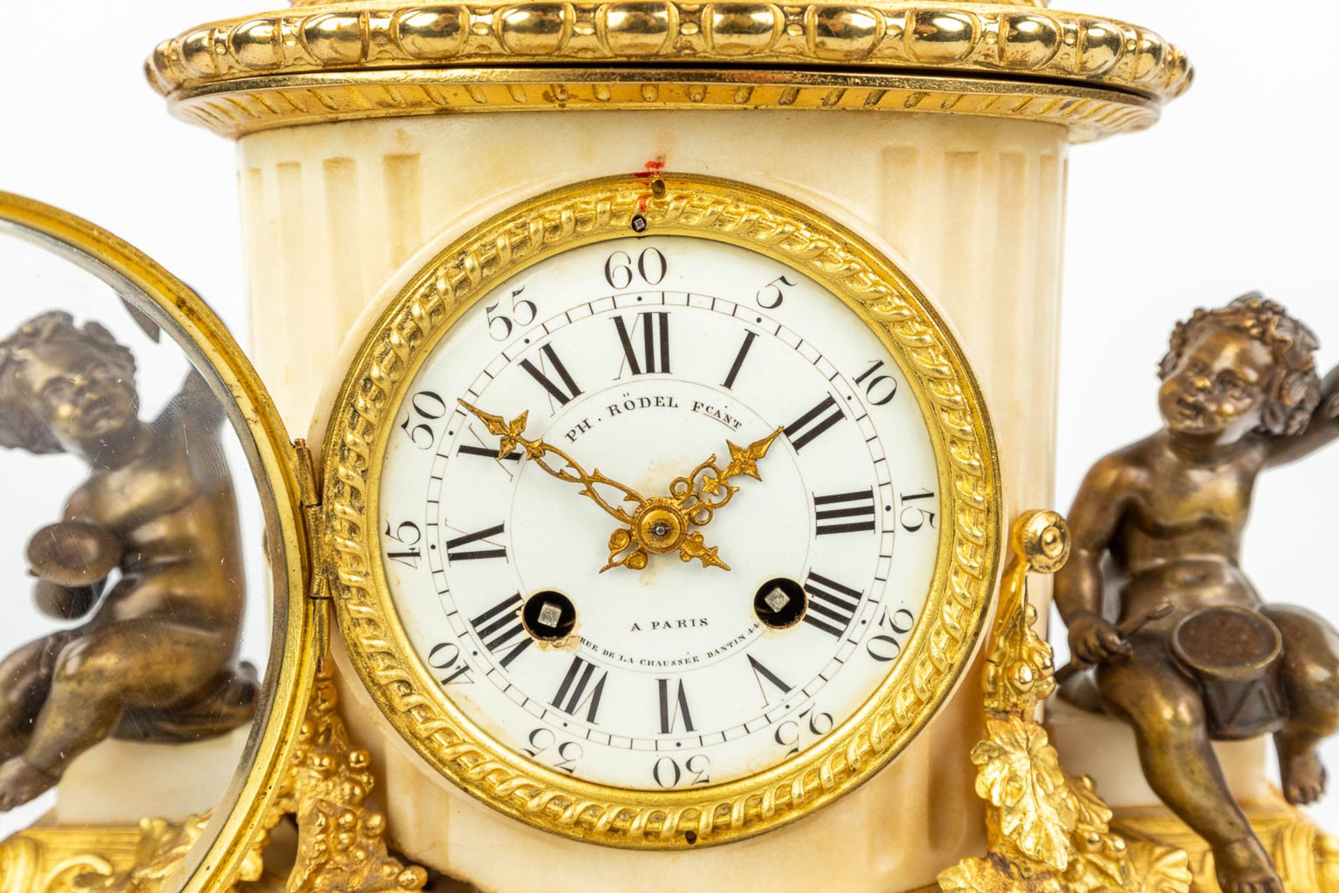 A clock made of marble and decorated with gilt and patinated bronze in Louis XVI style. (H:42cm) - Image 8 of 12