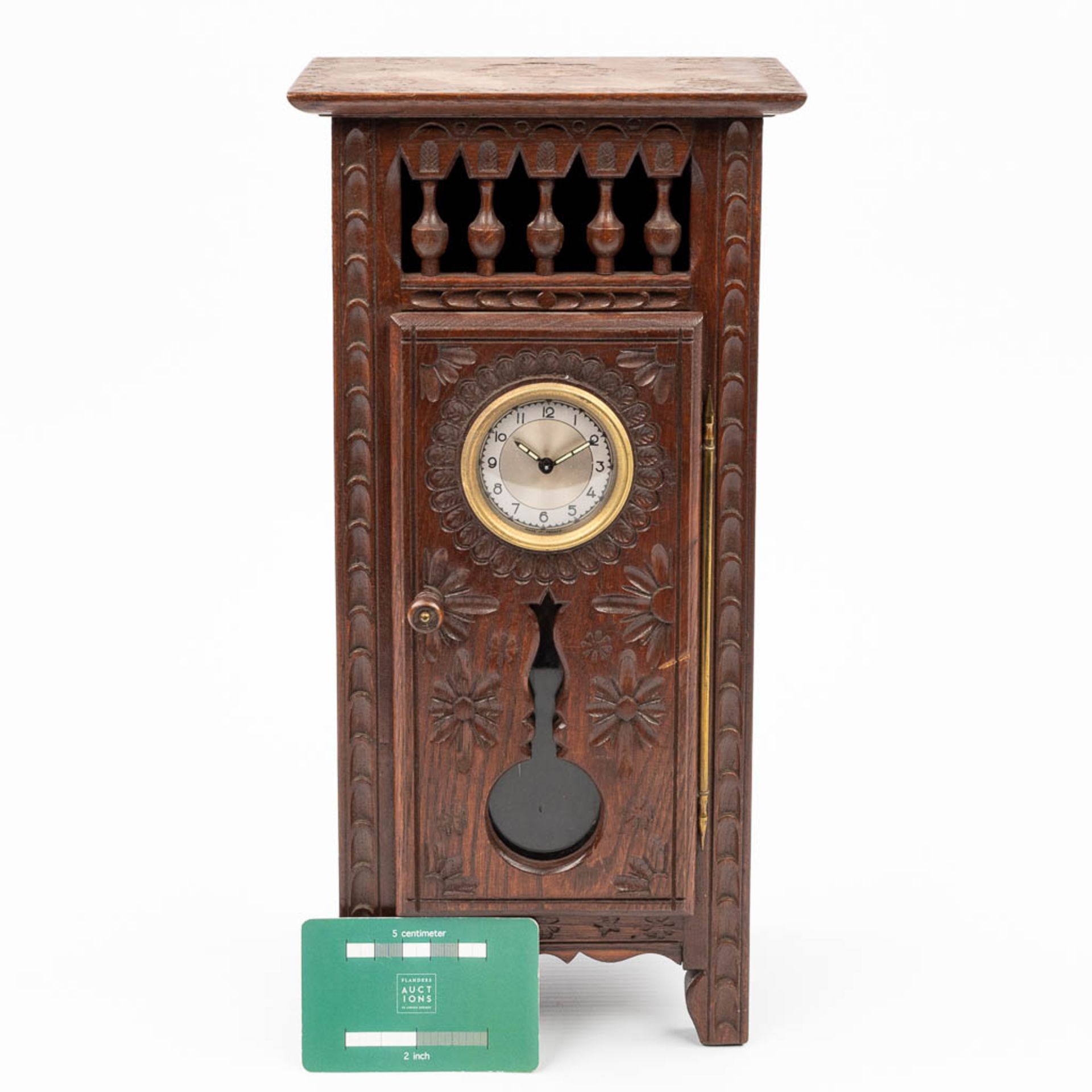 A table clock mounted in a miniature Breton cabinet. (H:35,5cm) - Image 2 of 15
