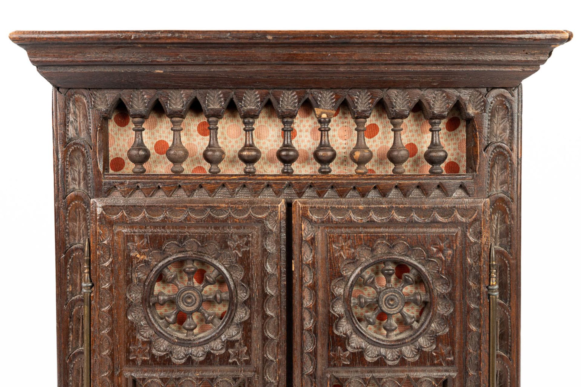 A miniature Breton cabinet, made of sculptured wood. (H:37cm) - Image 10 of 14