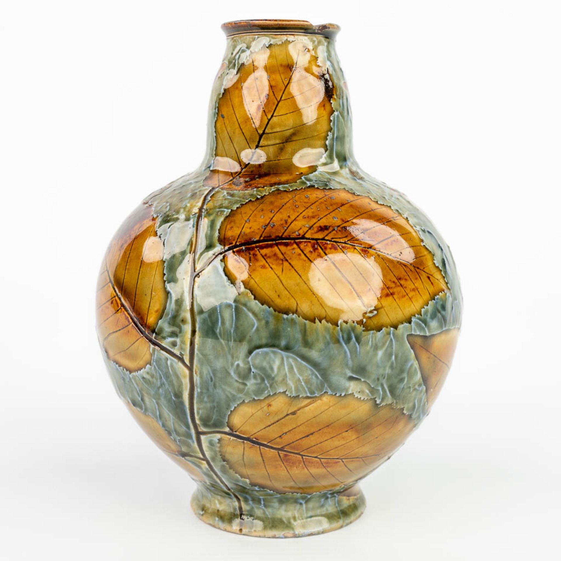 A vase decorated with leaves and made of stoneware marked Royal Doulton. (H:18cm) - Image 7 of 12