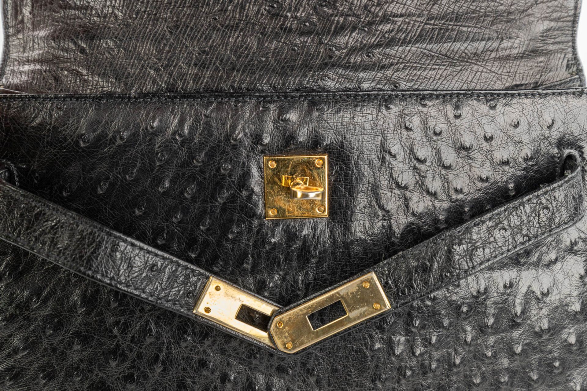 A handbag made of black ostrich leather and made by Olivier Gurtner in Switzerland. (H:28cm) - Image 13 of 17