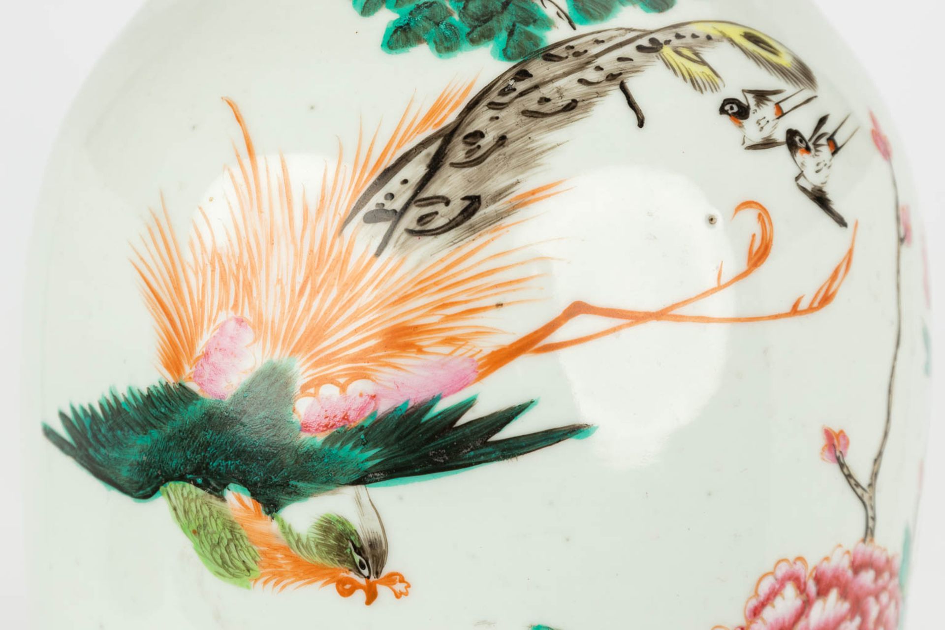 A Chinese vase made of porcelain, Famille rose and decorated with fauna and flora. (H:57cm) - Image 15 of 17