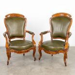 A pair of armchairs made of sculptured wood in Louis Philippe style. (H:101cm)