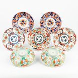 A collection of 7 Chinese and Japanese plates made of porcelain, Imari.