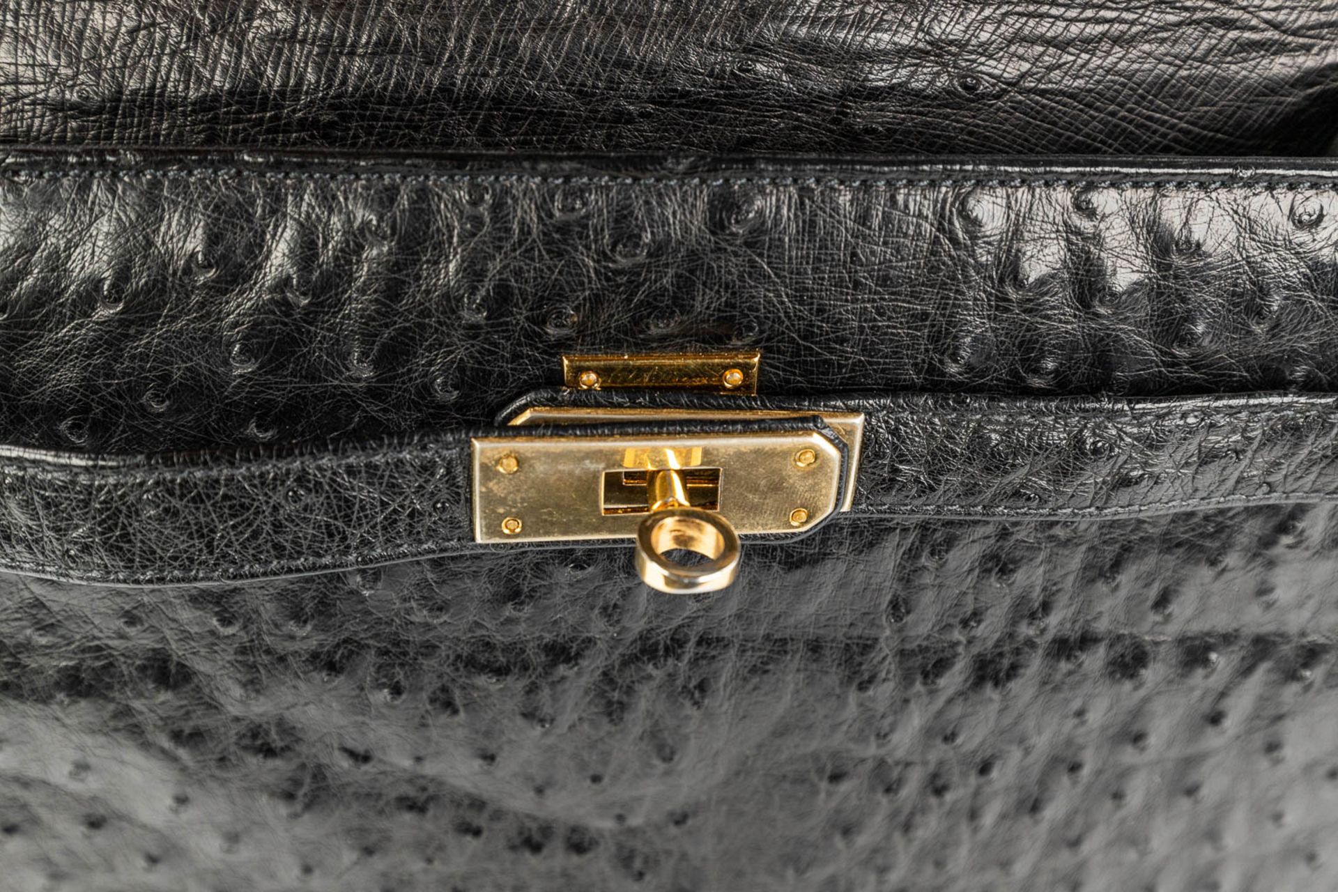 A handbag made of black ostrich leather and made by Olivier Gurtner in Switzerland. (H:28cm) - Image 11 of 17