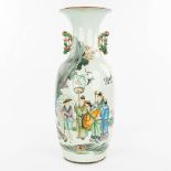 A Chinese vase made of porcelain and decorated with wise men. (H:57cm)