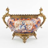 A table centrepiece made of Imari porcelain mounted with bronze. (H:40cm)