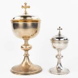 A collection of 2 ciboria made of silver, of which one is marked Biais Frres & Fils, Paris. (H:36cm
