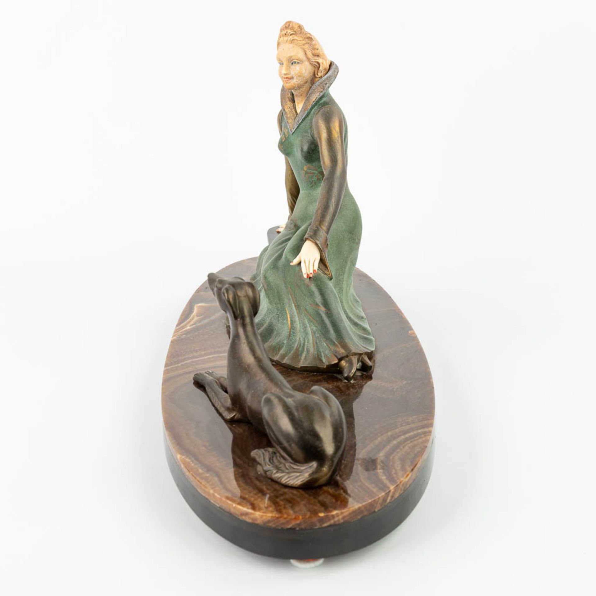 Salvatore MELANI (1902-1934) 'Lady with greyhound' an art deco statue made of spelter. (H:31cm) - Image 2 of 12