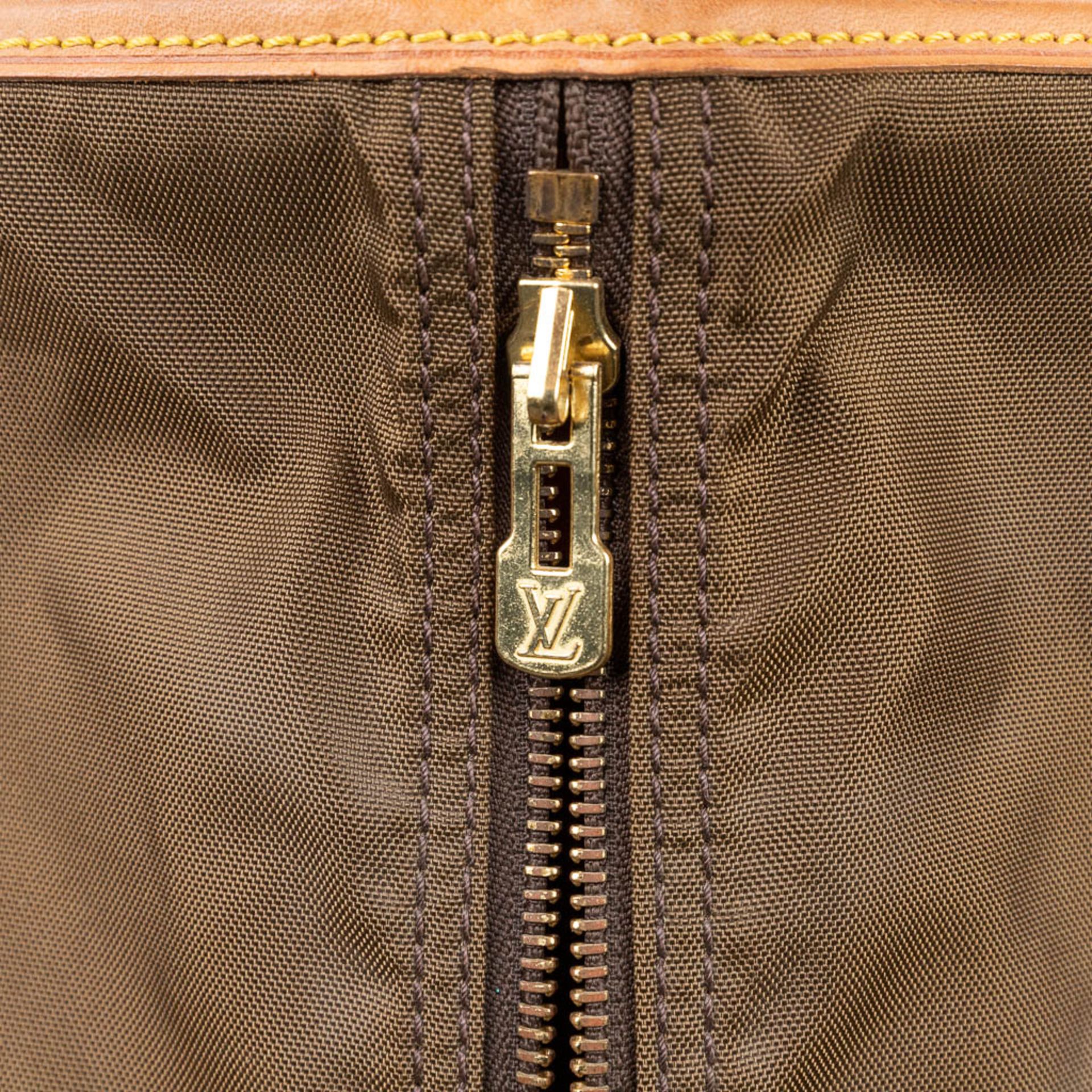 A garment suit traveller's bag made of leather by Louis Vuitton. (H:70cm) - Image 13 of 13