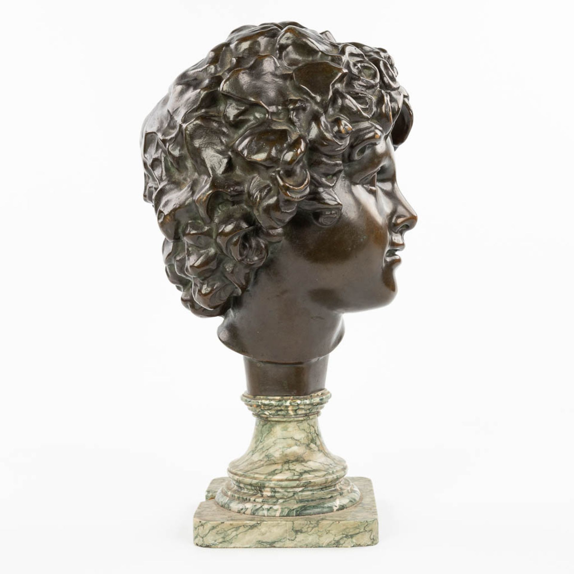 A bronze head of a young man, mounted on a marble base. Marked Peterman, Brussels. (H:40cm) - Image 2 of 11