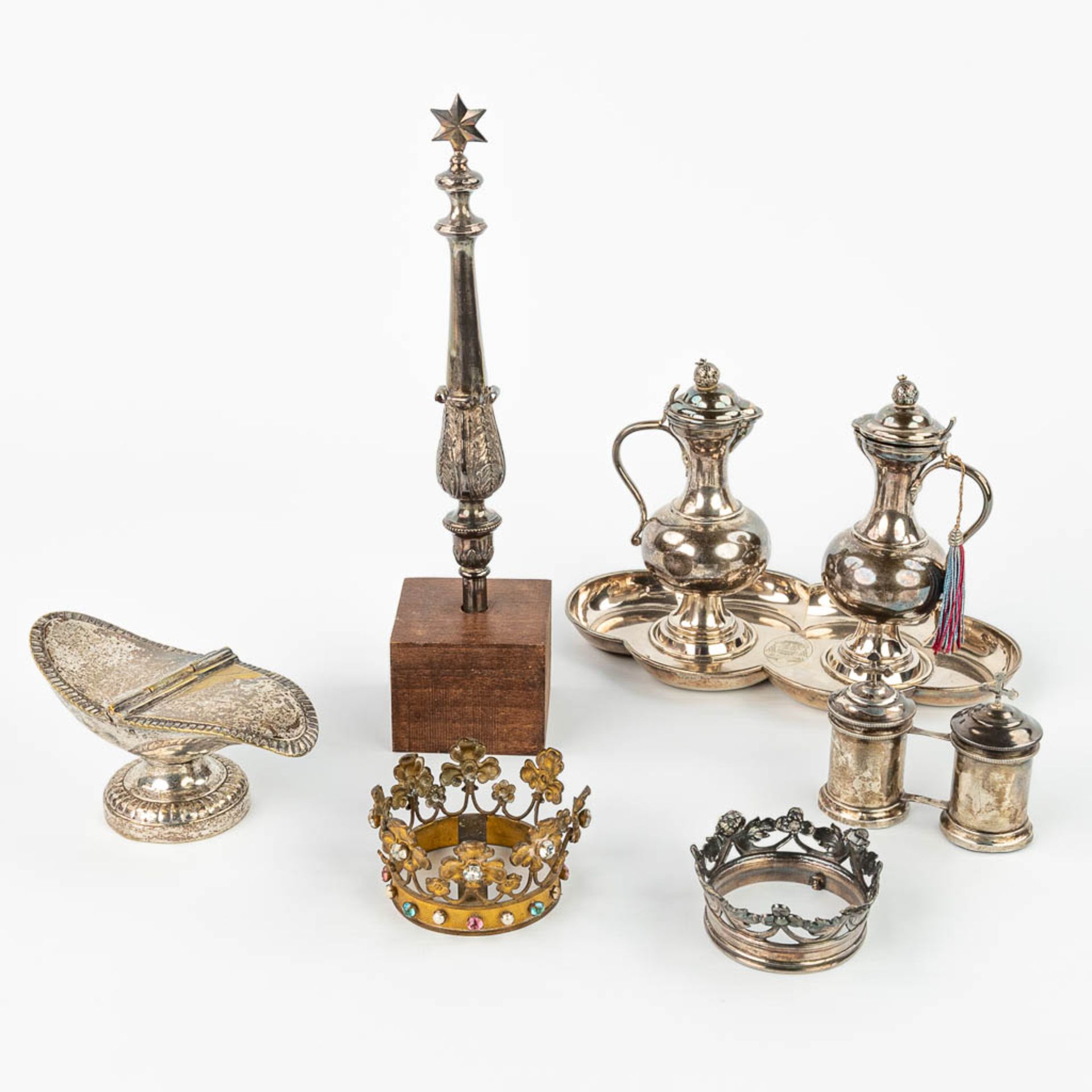 A collection of silver and silver plated items: Chrismatorium, Staff of Our Lady, Two crowns and a p