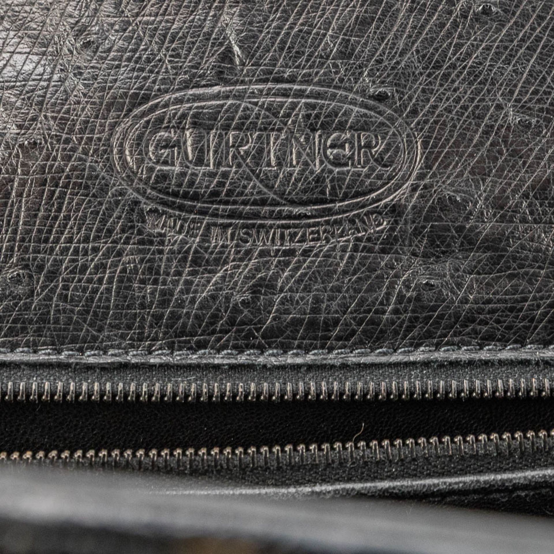 A handbag made of black ostrich leather and made by Olivier Gurtner in Switzerland. (H:28cm) - Image 9 of 17
