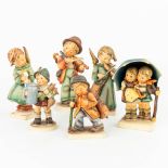 A collection of 6 Hummel statues:Ê: 21/I, 188-1948, 71, 89/I, 2/I, made by Goebel in Germany. (H:21c