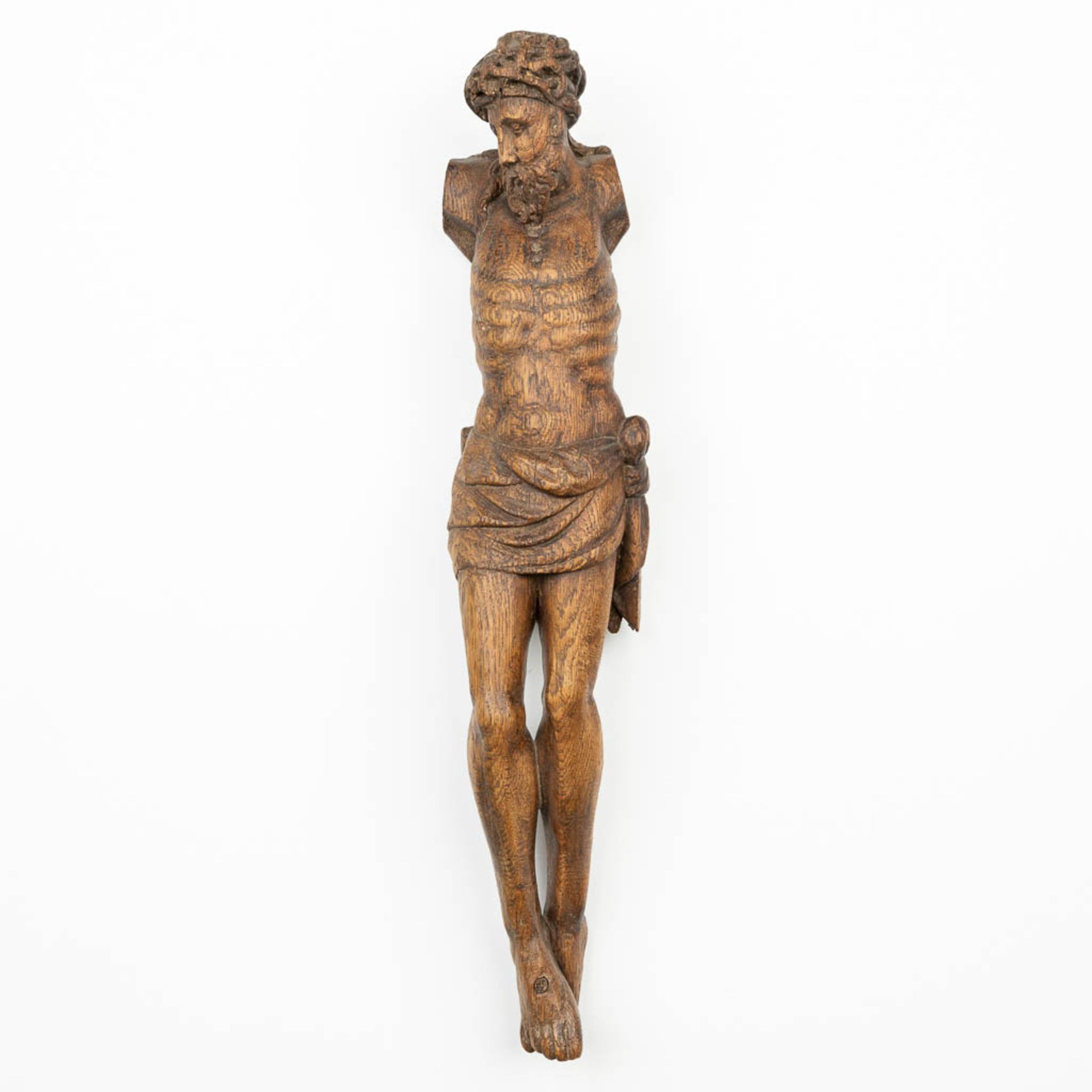 A wood sculptured corpus with a crown of thorns, 18th century. (H:76cm)