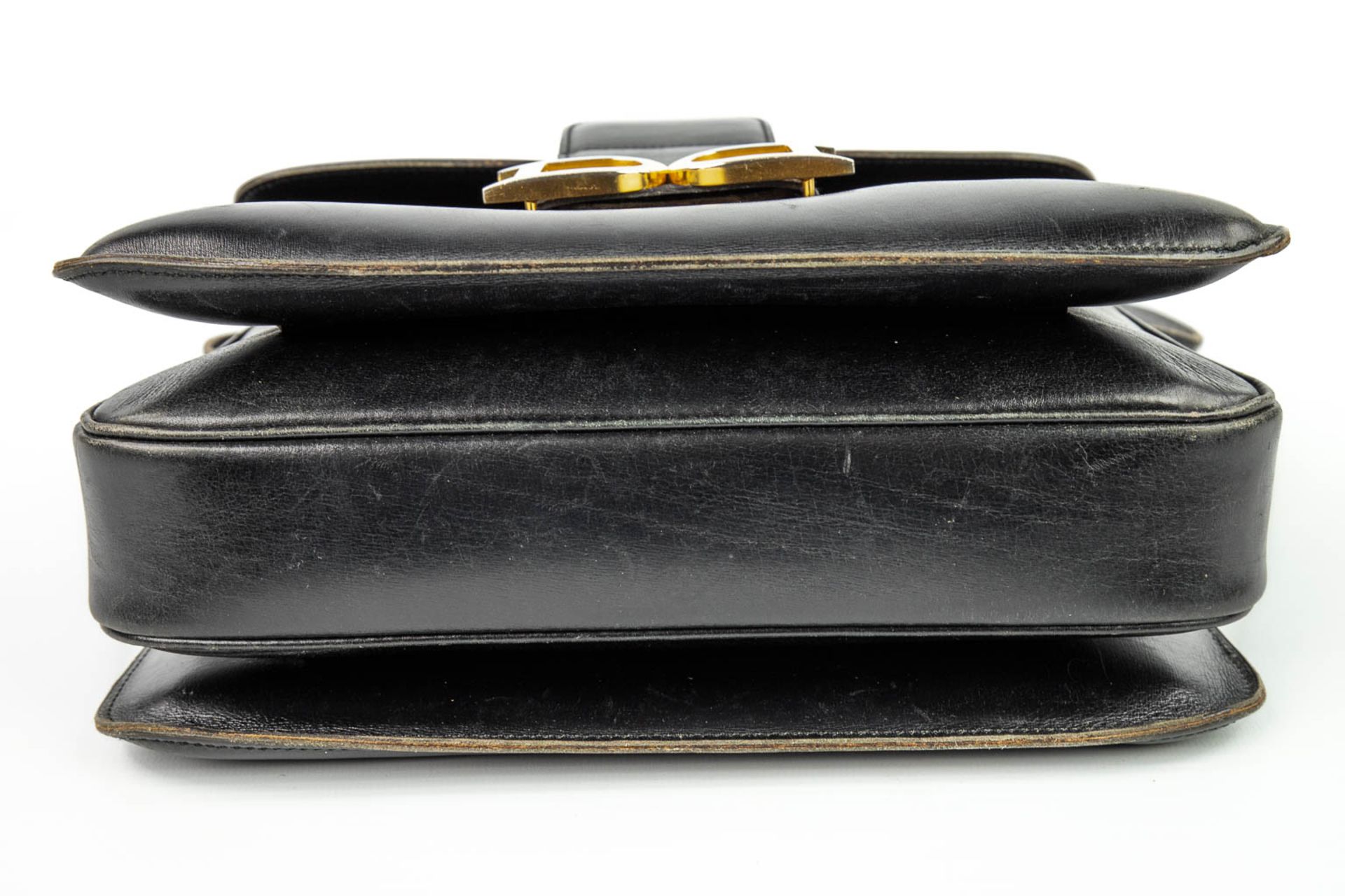 A purse made of black leather and marked Delvaux. (H:21cm) - Image 8 of 11