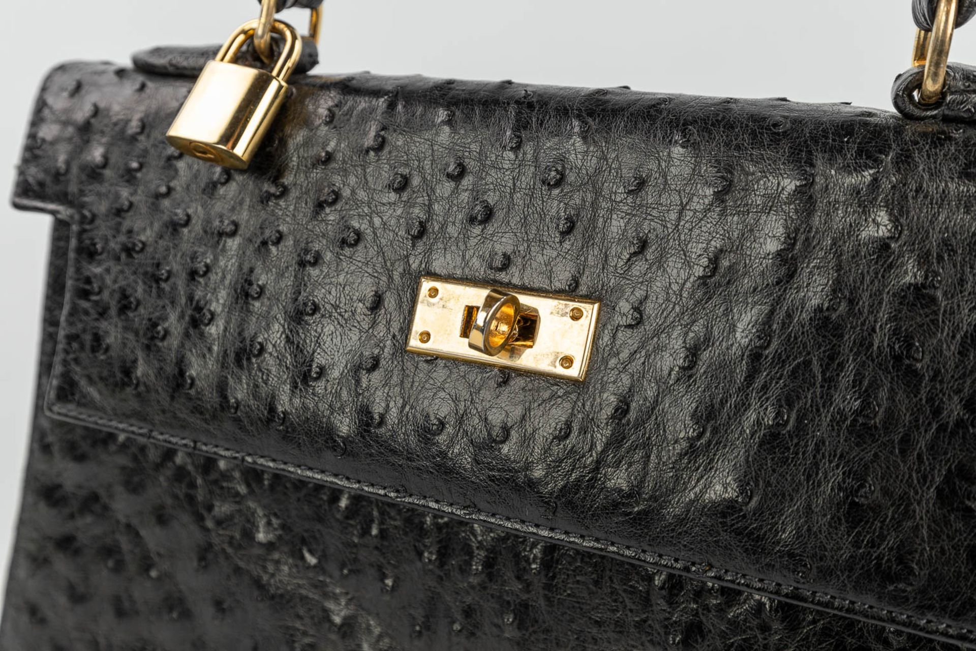 A handbag made of black ostrich leather and made by Olivier Gurtner in Switzerland. (H:28cm) - Image 10 of 17