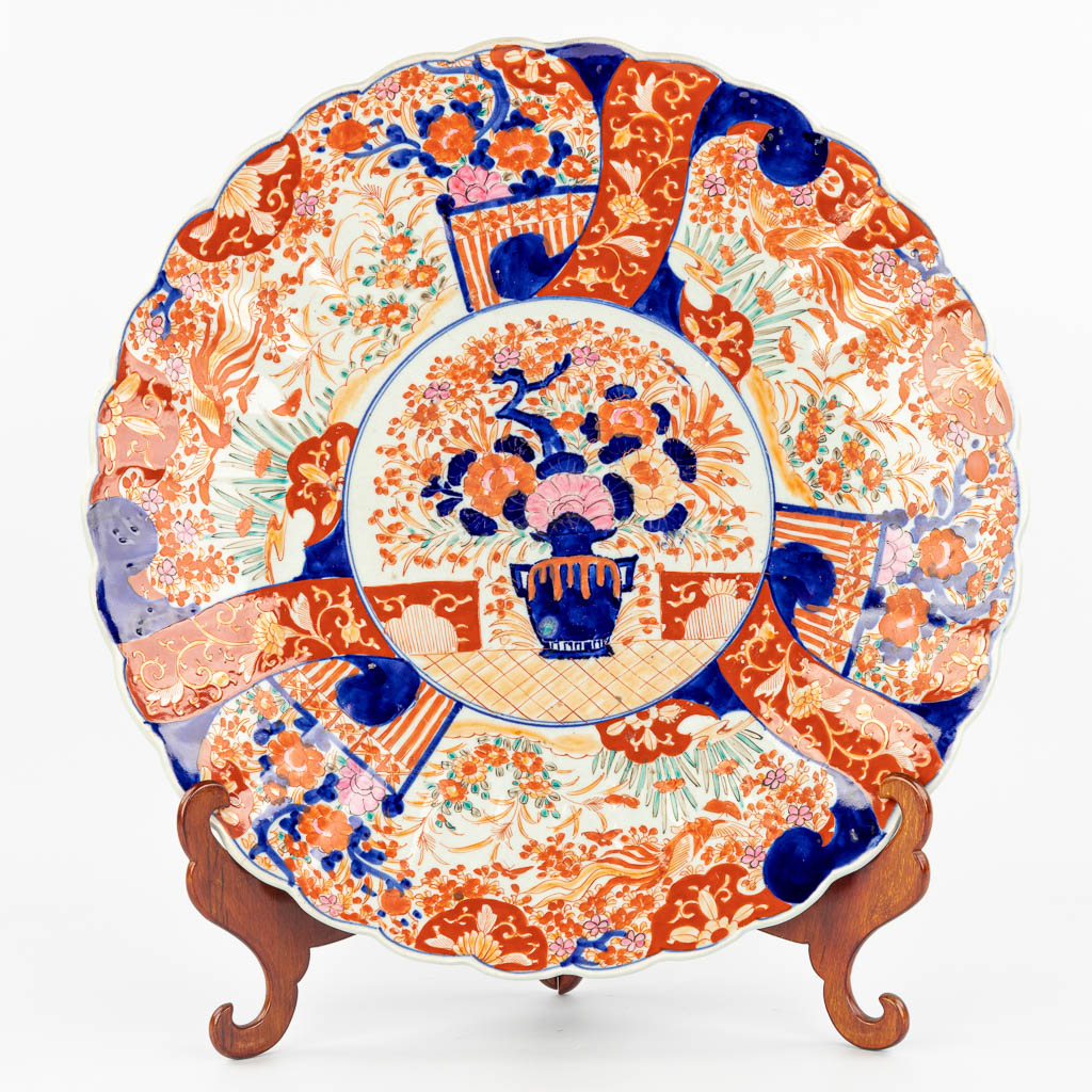 A large Japanese plate made of Imari porcelain.