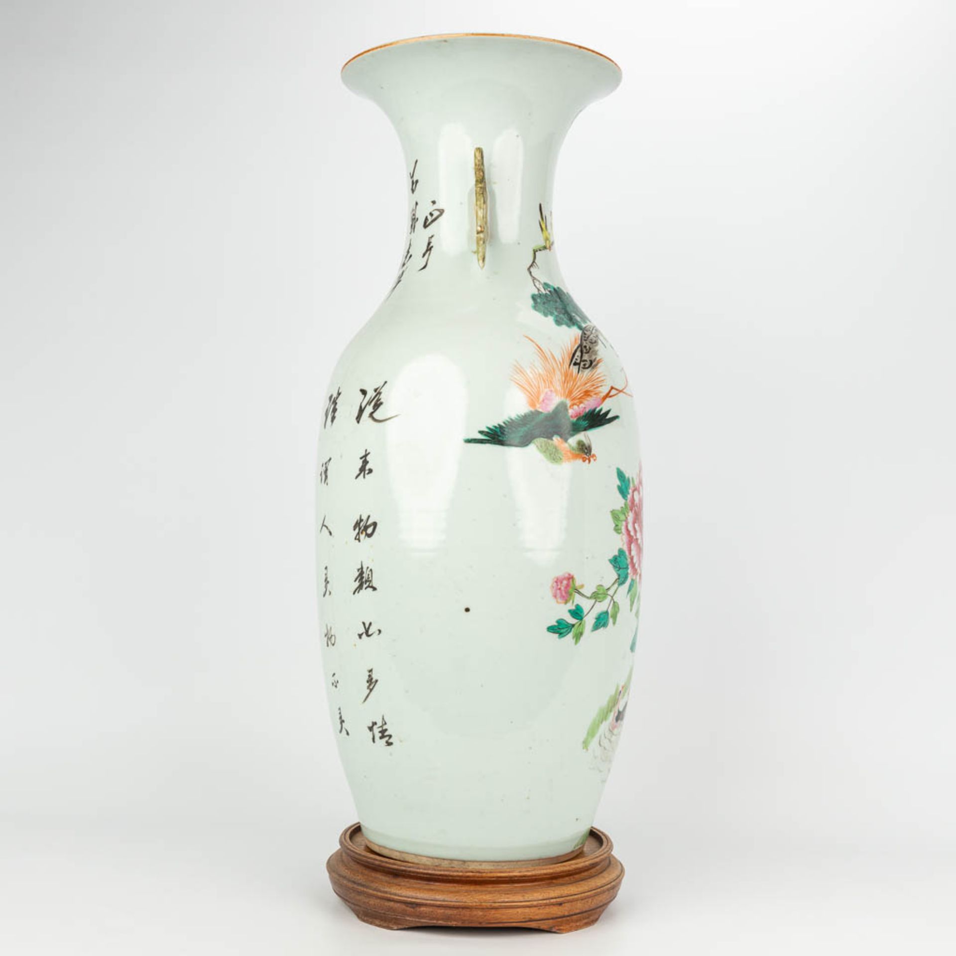 A Chinese vase made of porcelain, Famille rose and decorated with fauna and flora. (H:57cm) - Image 2 of 17