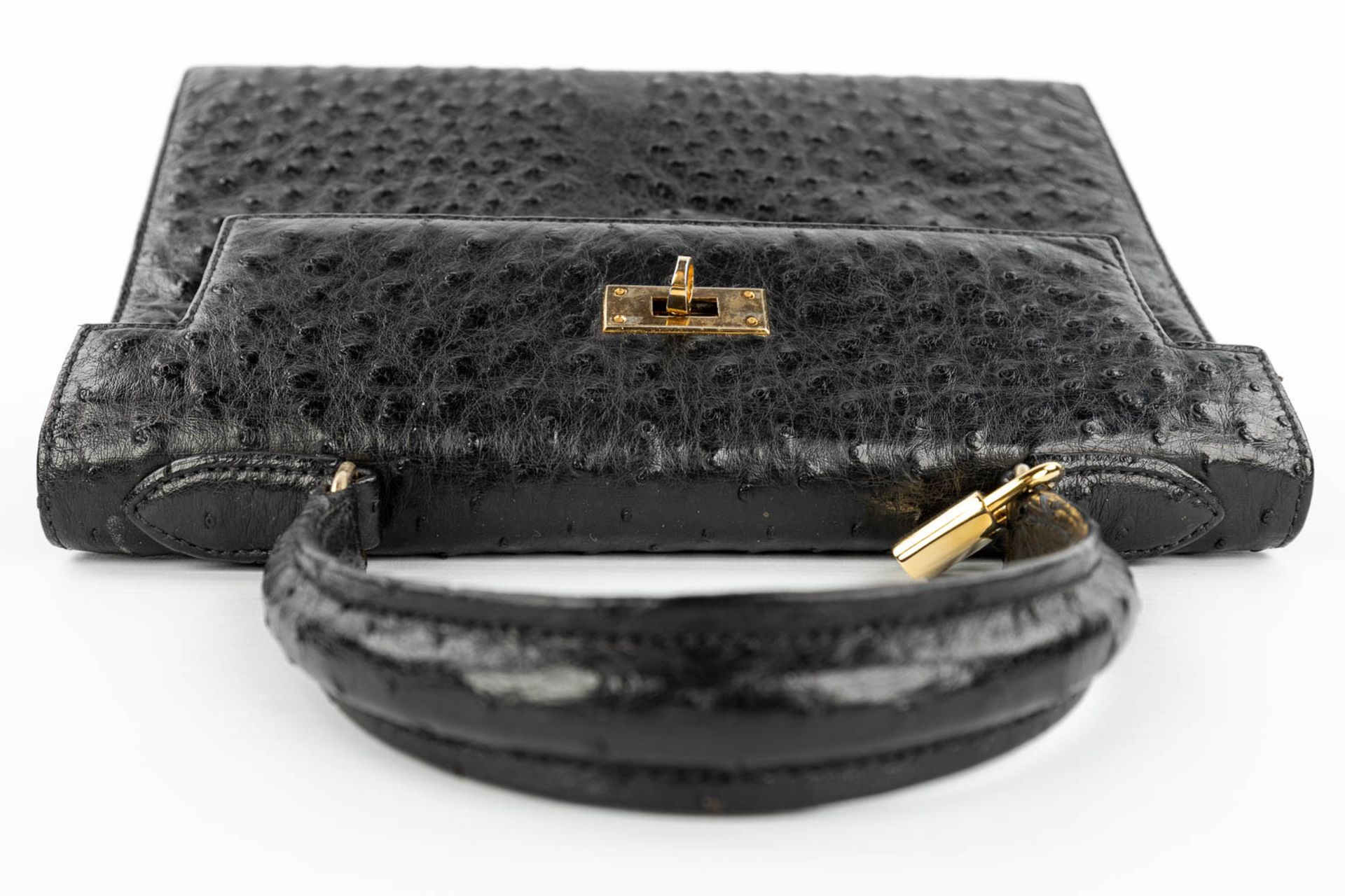 A handbag made of black ostrich leather and made by Olivier Gurtner in Switzerland. (H:28cm) - Image 8 of 17