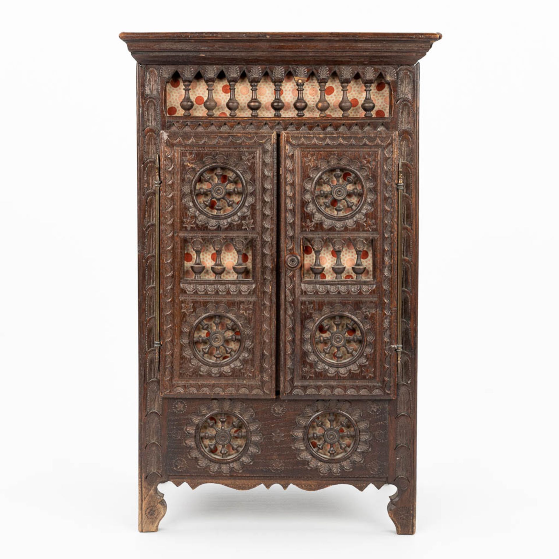 A miniature Breton cabinet, made of sculptured wood. (H:37cm) - Image 5 of 14