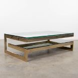 A Belgo Chrome G-Shape coffee table made of gilt metal and glass. (H:38cm)