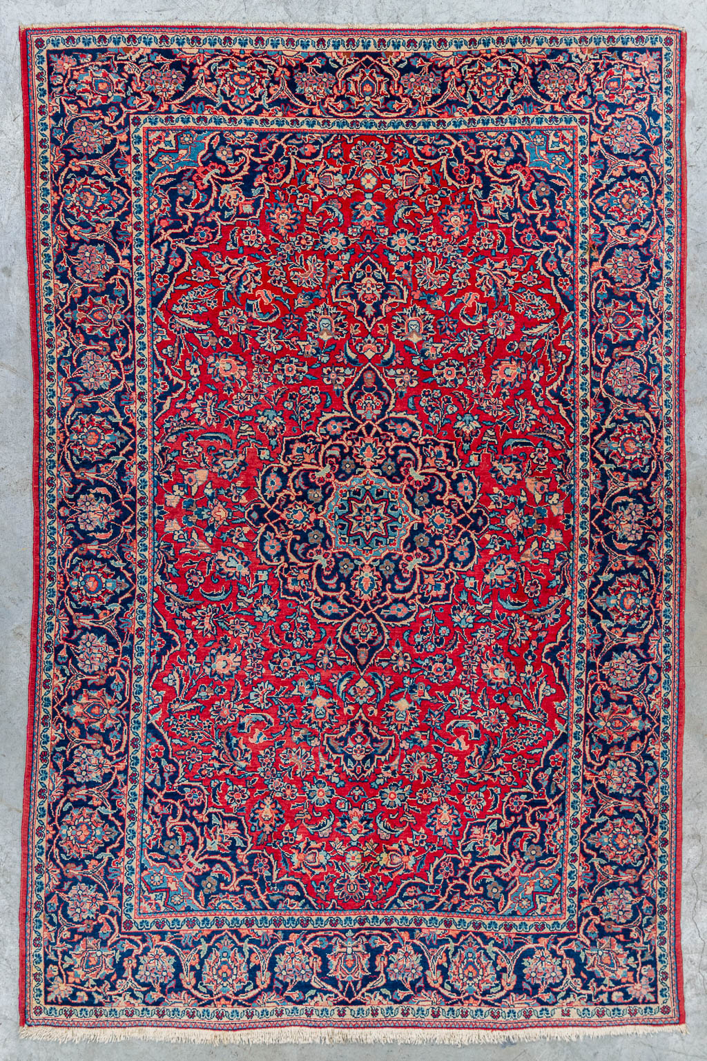 An Oriental hand-made carpet. (204 x 134 cm)