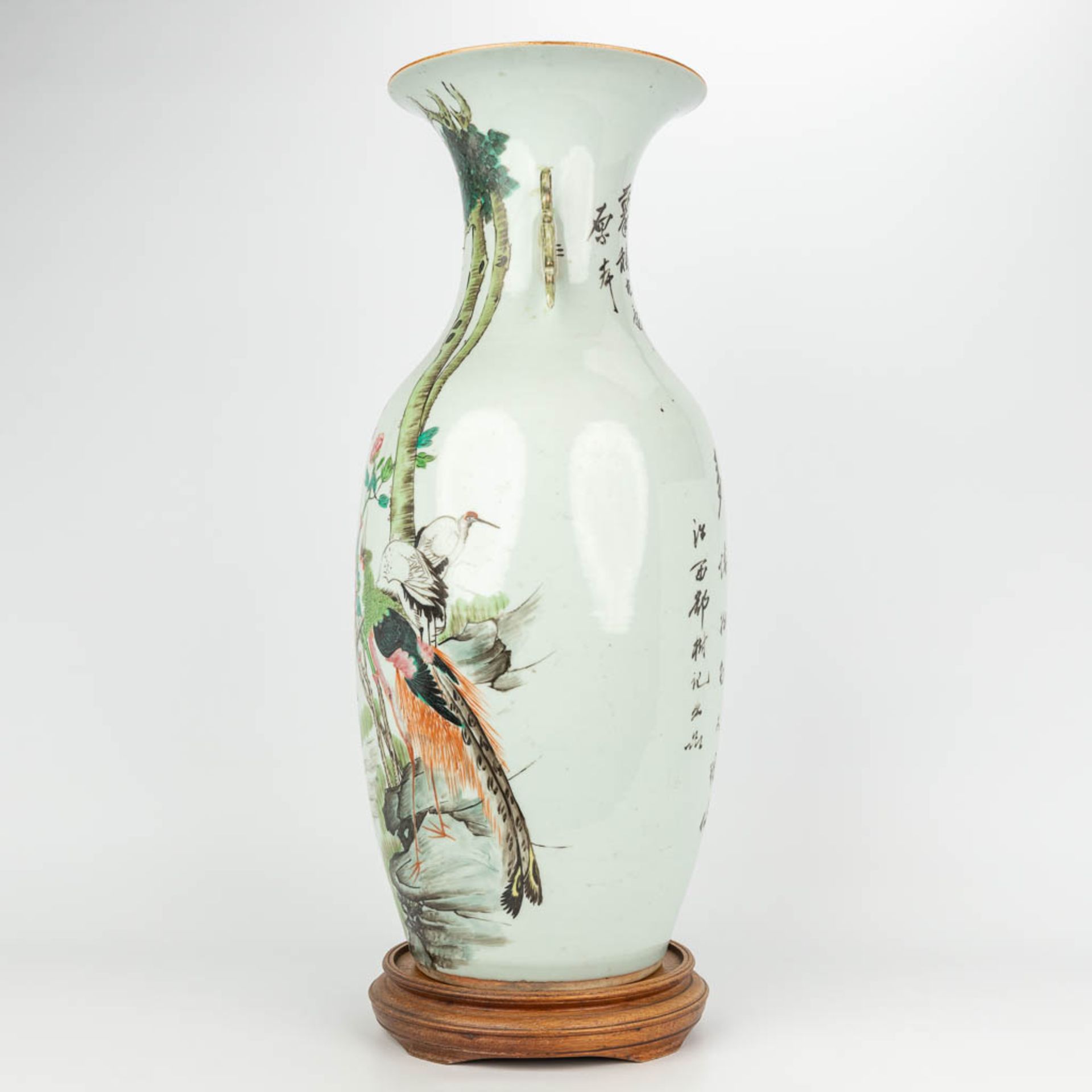 A Chinese vase made of porcelain, Famille rose and decorated with fauna and flora. (H:57cm) - Image 11 of 17