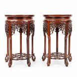 A pair of Chinese pedestals made of finely sculptured hardwood. (H:31cm)