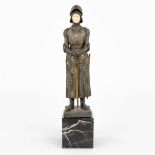 A Chryselephantine spelter statue of Jeanne D'arc marked 'Jeanne La Sainte'. (H:25cm)