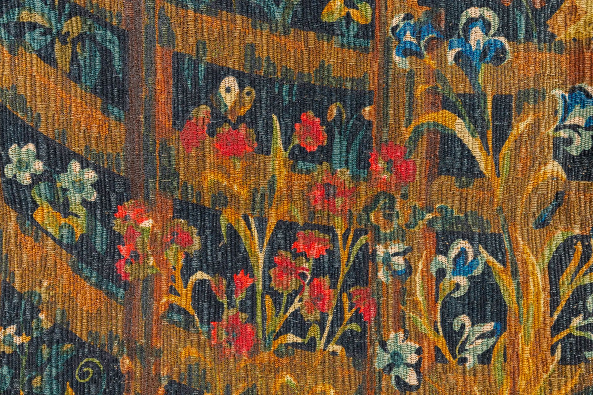 A tapestry with a printed image of a unicorn in a flower field. (H:136cm) - Image 5 of 6