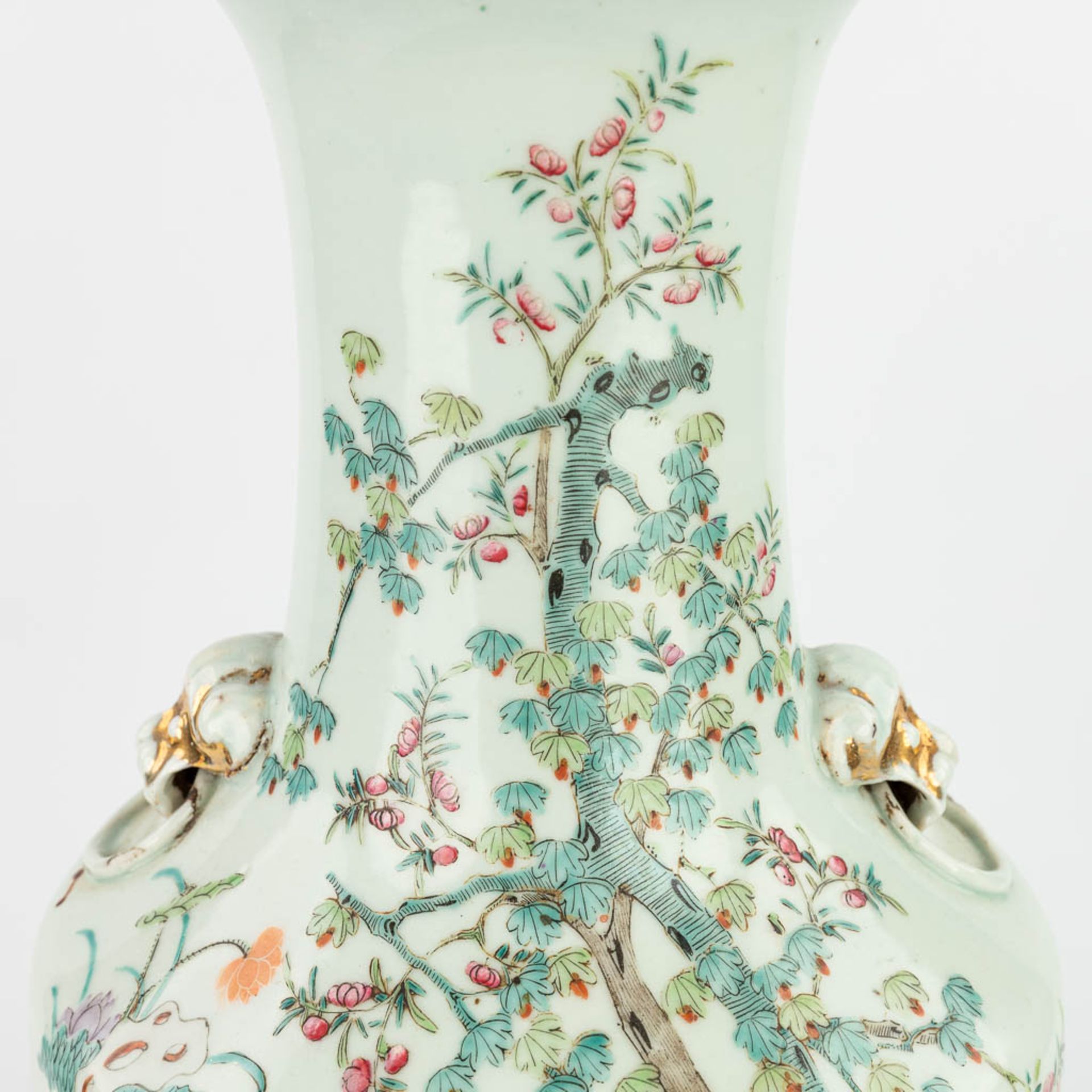 A Chinese vase made of porcelain decorated with ladies at a table. (H:57,5cm) - Image 12 of 14