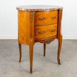 A side table with a marble top and mounted with bronze in Louis XVI style. (H:73,5cm)