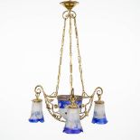 An art-deco chandelier made of bronze and mounted with pâte-de-verre glass lampshades, marked Loti,