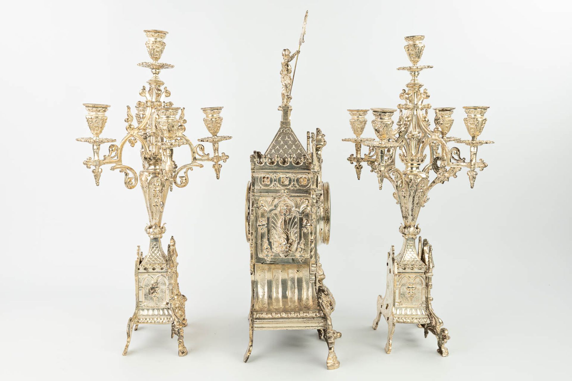 A three-piece garniture clock with candelabra, made of silver-plated bronze in gothic revival style. - Image 12 of 18