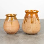 A set of 2 'Biot' pots, made of glazed earthenware. France. (H:52cm)