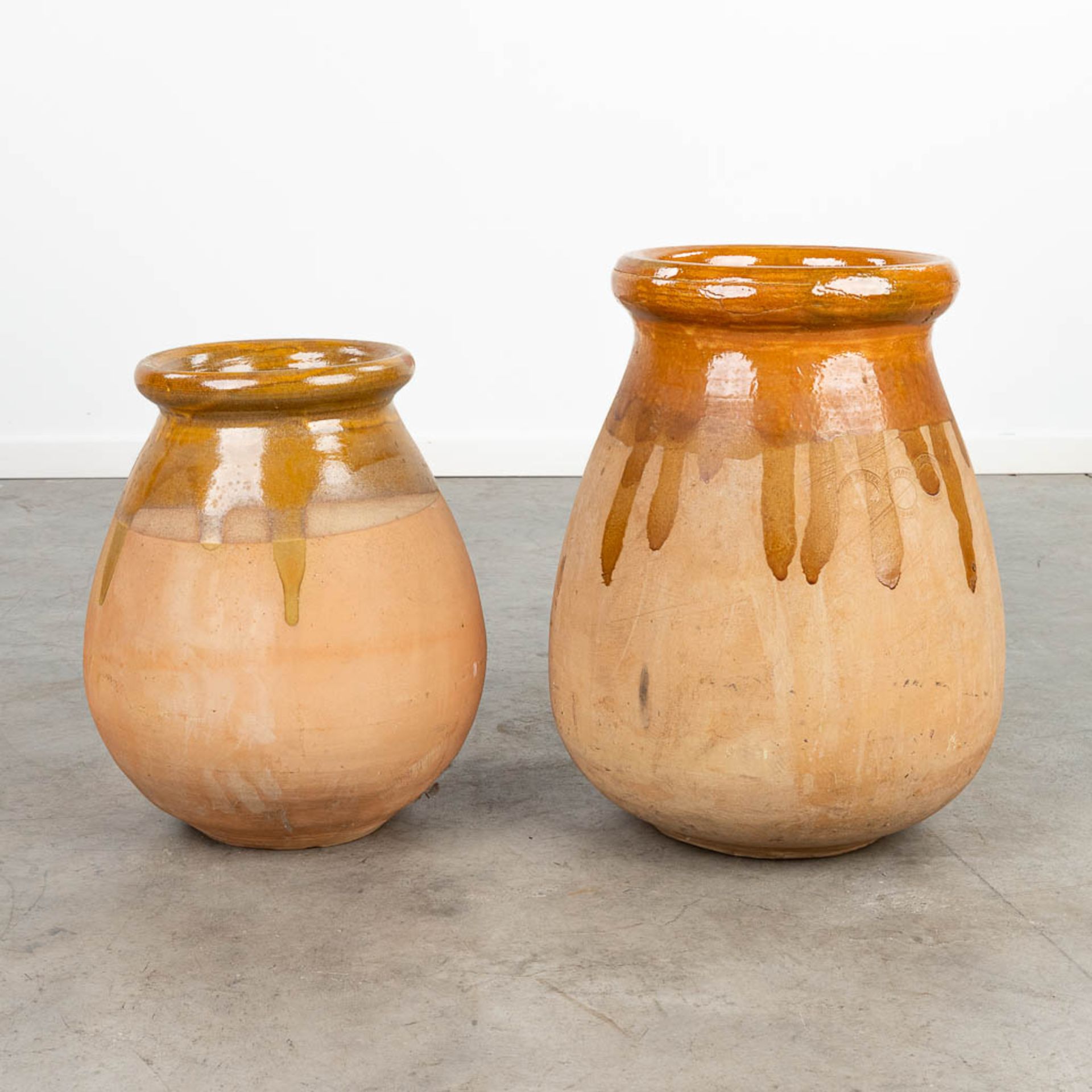A set of 2 'Biot' pots, made of glazed earthenware. France. (H:52cm)