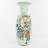A Chinese vase made of porcelain and decorated with a temple scne and calligraphic texts. (H:57cm)