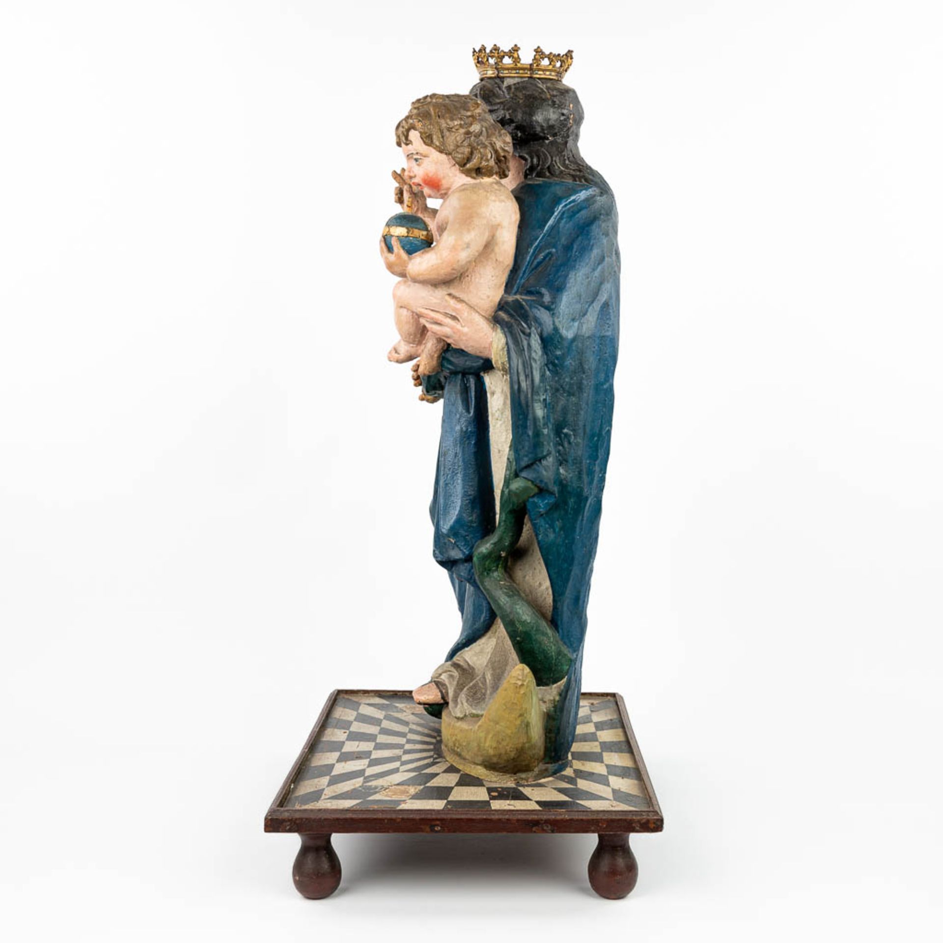 A patinated wood statue of Madonna with a child, standing on the serpent and half-moon. - Image 4 of 18