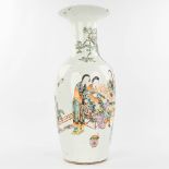 A Chinese vase made of porcelain and decorated with ladies and children in the garden. (H:58cm)