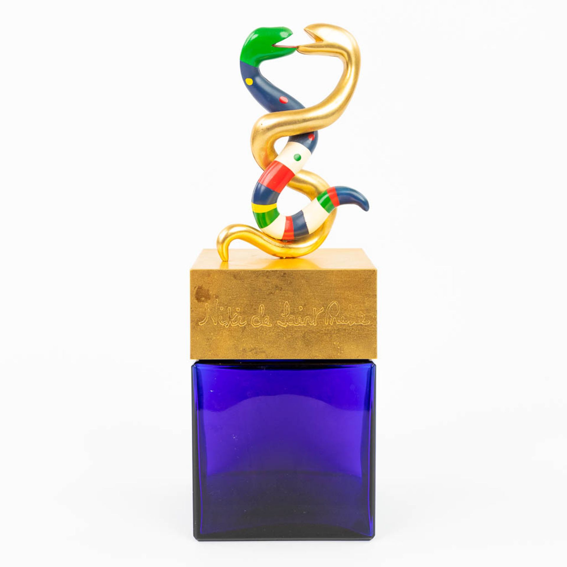 Niki DE SAINT-PHALLE (1930-2002) 2 snakes on a perfume display bottle (c.1980). (H:36cm)