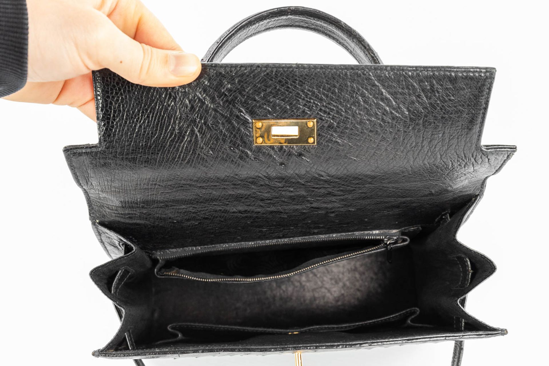 A handbag made of black ostrich leather and made by Olivier Gurtner in Switzerland. (H:28cm) - Image 14 of 17