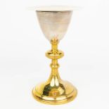 A gold-plated silver chalice made in neogothic style and marked 800/1000. (H:21,5cm)