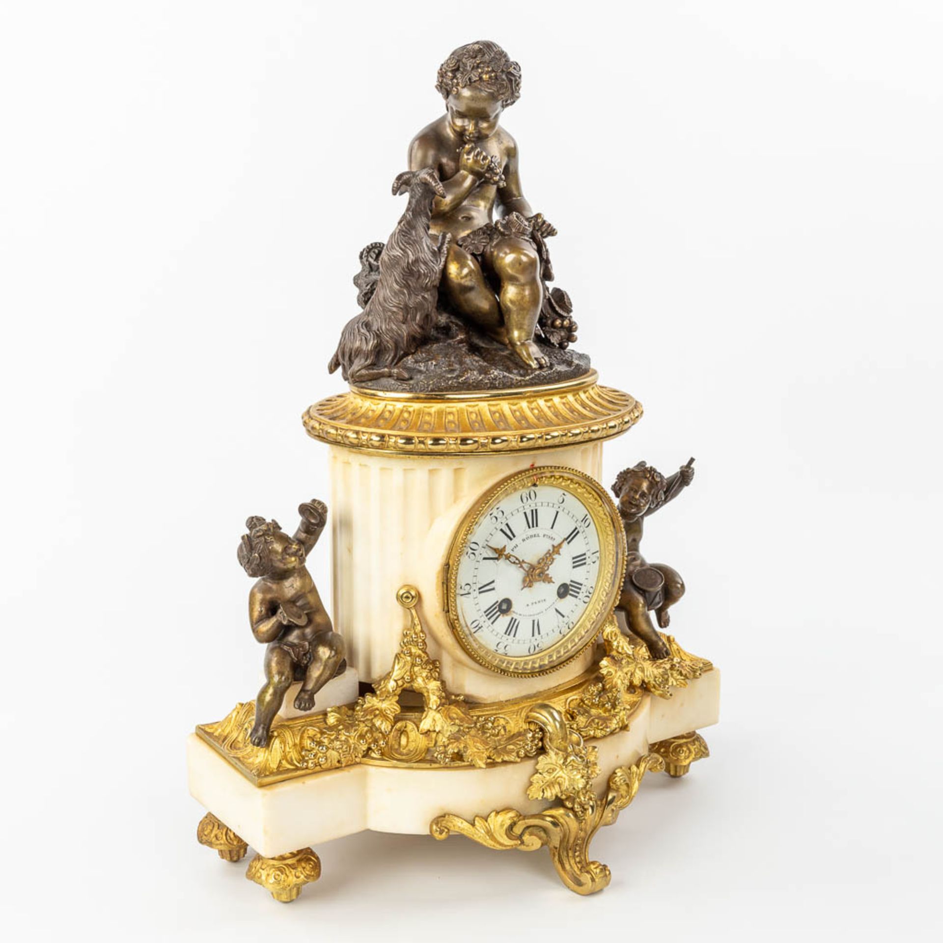 A clock made of marble and decorated with gilt and patinated bronze in Louis XVI style. (H:42cm) - Image 3 of 12