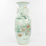 A Chinese vase made of porcelain and decorated with ladies. (H:57,5cm)