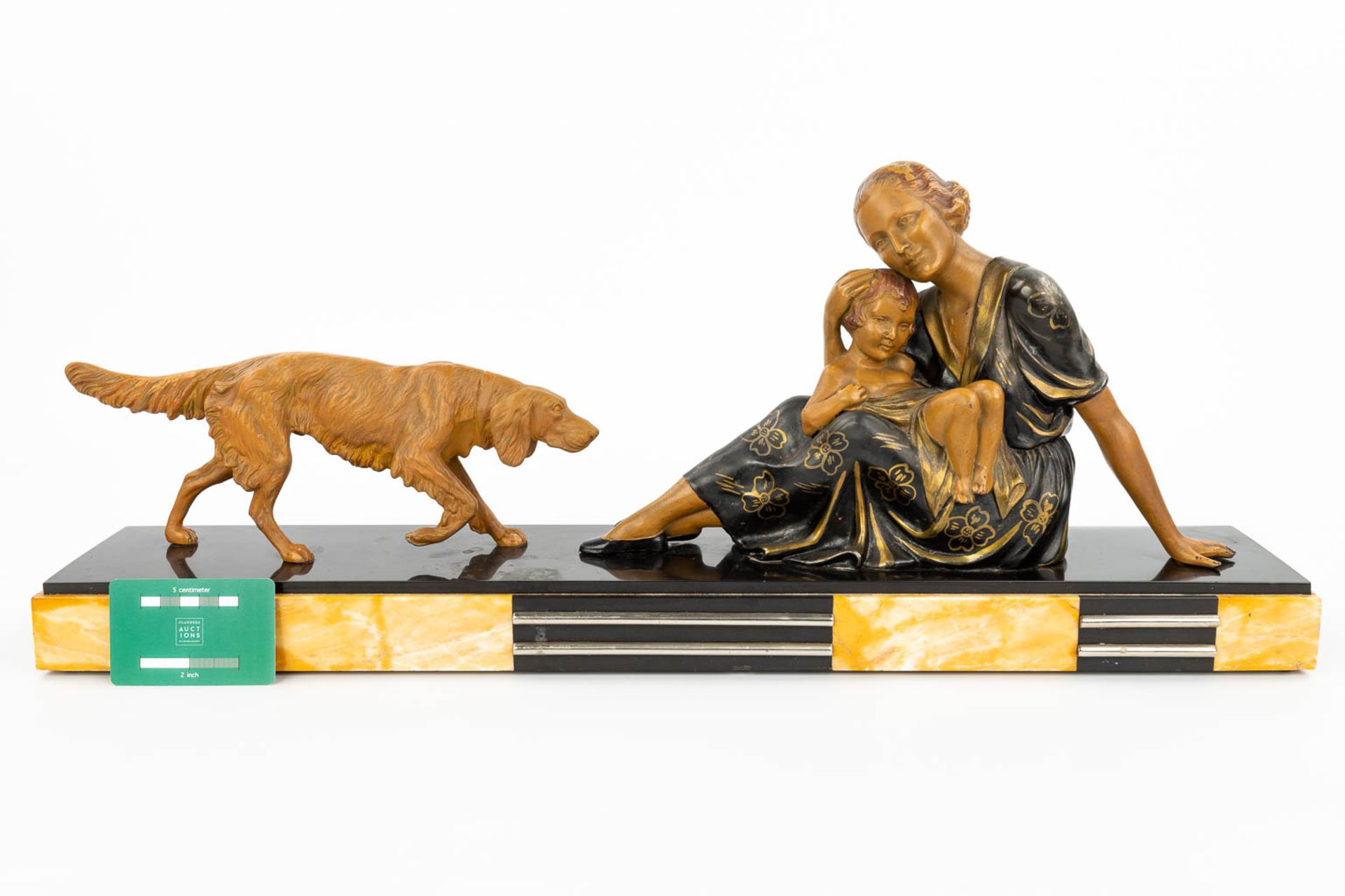 An art deco style statue of a woman with child and her dog, made of spelter and mounted on a marble - Image 7 of 12